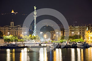 Port with statue of Columbus in night. Barcelona