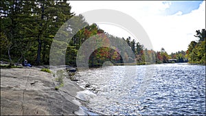 Photoshoot of the autumn leaf color in Ontario lake