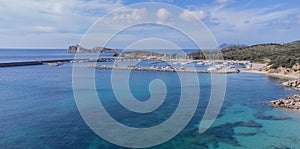 Port of teulada and aerial view of porto tramatzu beach