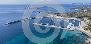 Port of teulada and aerial view of porto tramatzu beach