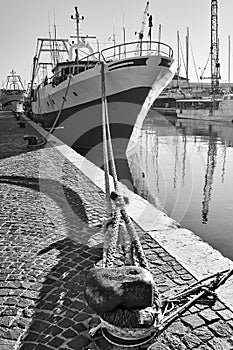 Port and tied up ship at a wharf