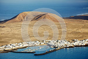 The port town of Caleta del Sebo seen from the neighbouring island of Lanzarote