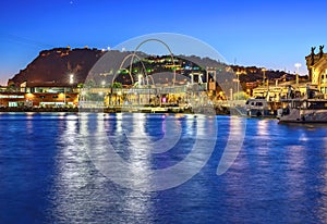 Port Vell and Montjuic Mountain at night Barcelona, Catalonia Spain