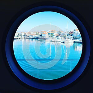 Port view through the roundish window.