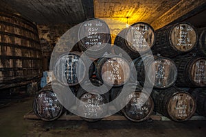 Port wine barrels in cellar, Vila Nova de Gaia, Porto, Portugal.