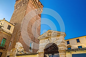 Porta Castello Tower Torre and Gate Terrazza Torrione brick building in old historical city