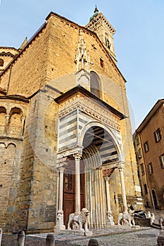 Porta dei Leoni Bianchi on the right transept of Basilica of Santa Maria Maggiore. Bergamo. Italy photo