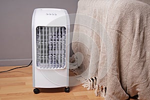 Portable air cooler and humidifier in living room photo