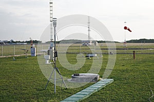 A portable automatic weather station is located in the large meteorological garden. This tool is used to retrieve meteorological