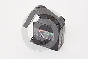 Portable battery tester on white
