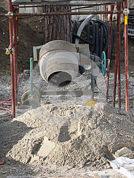portable concrete mixer or cement mixer in a construction site