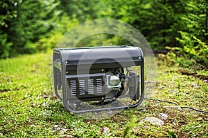 Portable gasoline generator in the open air. photo