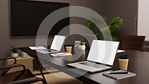 Portable notebook laptop computer mockup on modern dark wood meeting table