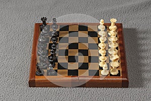 portable and pocket sized chess set all ready for a game