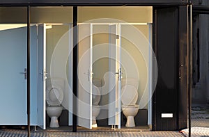 Portable public toilets with  doors opened