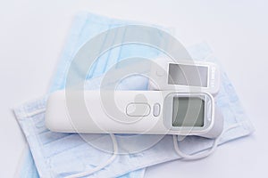 Portable Pulse Oximeter on Background face mask to monitor oxygen level at home