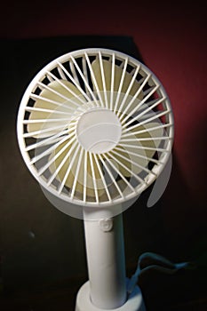 A portable rechargeable fan for children, computers.