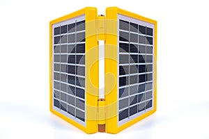 Portable solar panel isolated on white background. Small solar battery cell panel. Mini charging system. Renewable