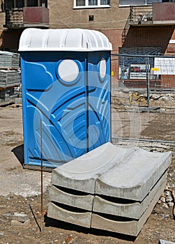 Portable toilet at the road construction area