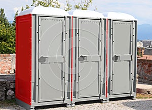 portable toilets booths installed in a public park in the city a