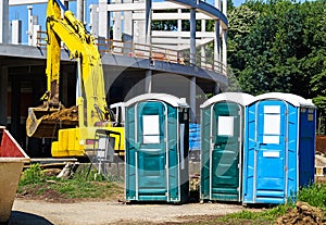 Portable toilets at the construction site photo