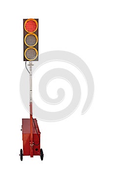 Portable traffic light powered by batteries and with manual or auto actuation isolated on white background with space for text