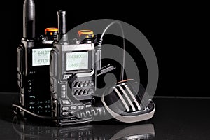 Portable two-way radios with microphone