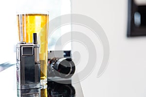Portable vaporizer, digital camera and beer