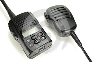 Portable walkie-talkie with handheld microphone isolated on a white background