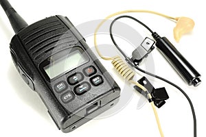 Portable walkie-talkie with headset isolated on a white background