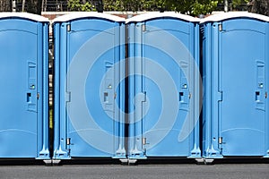 Portable wc. Public mobile toilet set in the street. Transportable photo