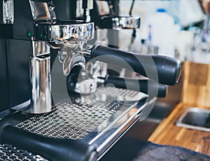 Portafilter on coffee machine in cafe