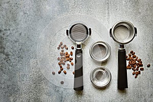 Portafilters for making espresso coffee in a rogue coffee machine, top view with copy space