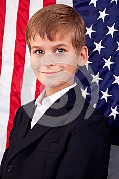 Portait of Caucasian boy with American flag
