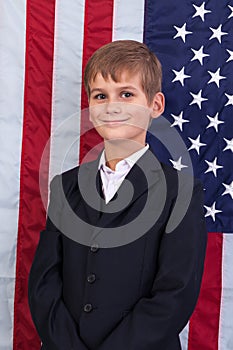 Portait of Caucasian boy with American flag
