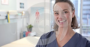 Portait of caucasian female physiotherapist smiling at rehab center, copy space