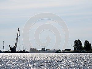 Portal crane on the wharf on Lake Onega