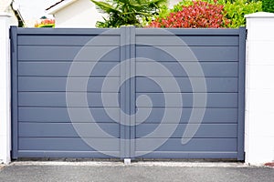 Portal grey metal aluminum house gate in street view