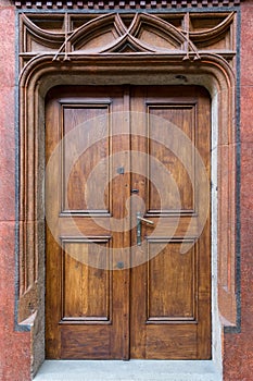 Portal with old refurbished doors