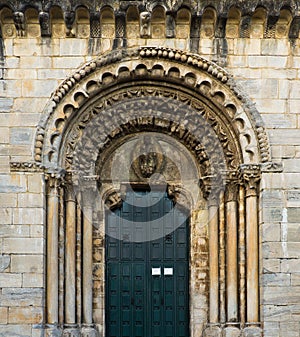 Portal of San Naciolas de Portomarin church photo