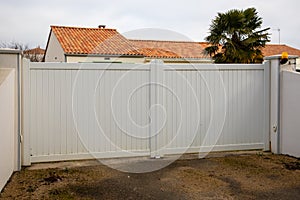 portal steel beige double high large white metal gate fence on modern house street