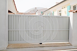 Portal steel big white beige metal gate fence on modern door clear house street