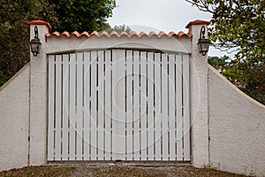 Portal steel big white beige metal gate high fence on modern door clear house street