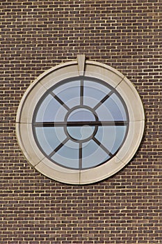 Portal style window on brick wall