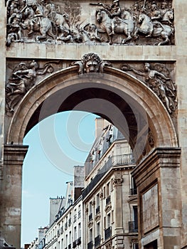 Porte Saint Denis, Paris street and the haussmanian building view of the capital city of France photo