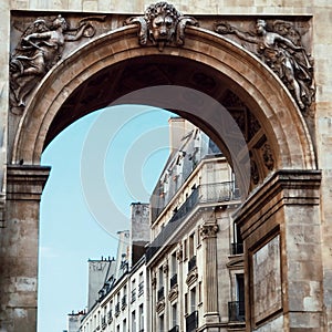 Porte saint denis, Paris street and the haussmanian building view of the capital city of France photo