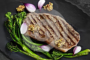 Porterhouse Steak Grilled with Broccolini Pickled shallots and Mustard