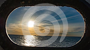 Porthole on ship on Pacific Ocean