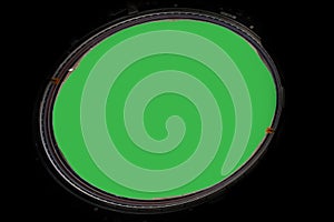 Porthole of space station isolated on green background. Elements of this image furnished by NASA