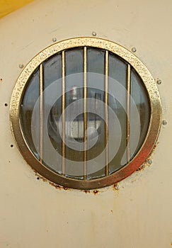 Porthole window on a ship.